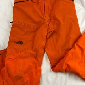 The North Face Men's Spectre Hybrid Pants in orange